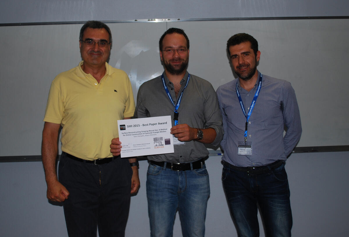 Foto der Verleihung mit Joaquim Jorge, Thomas Vierjahn und Giuseppe Patanè