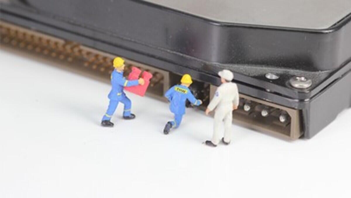 Miniature figures work on a hard disk